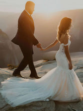 Elegant Off-the-shoulder Trumpet/Mermaid Wedding Dress with Appliques Lace and Tulle Sweep Train